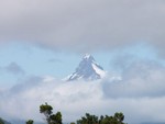 Le volcan Corcovado dans les nuages.
De vulkaan Corcovado.