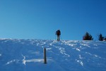 En raquette au-dessus de Morgins.
Stphane op de raquettes omhoog de berg op.